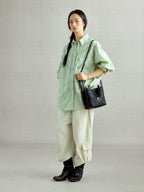 An elegant bucket bag made from lattice