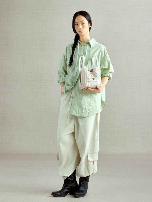 An elegant bucket bag made from lattice