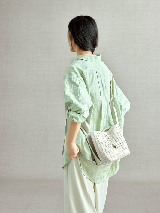 An elegant bucket bag made from lattice