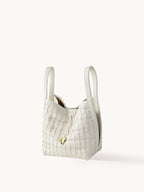 An elegant bucket bag made from lattice