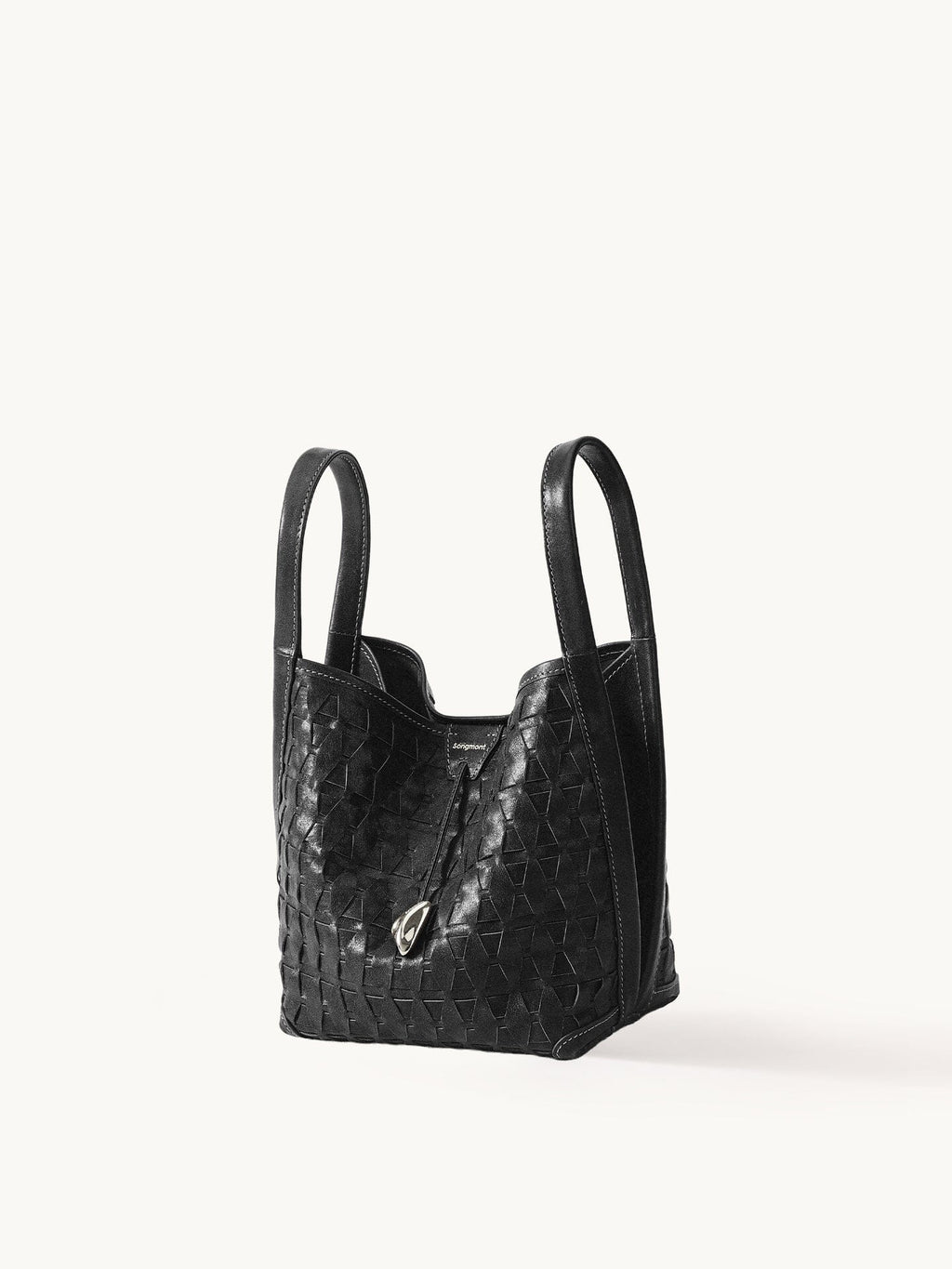 An elegant bucket bag made from lattice