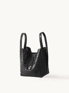 An elegant bucket bag made from lattice