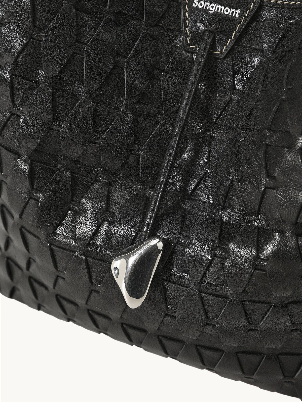 An elegant bucket bag made from lattice