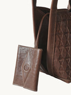 An elegant bucket bag made from lattice