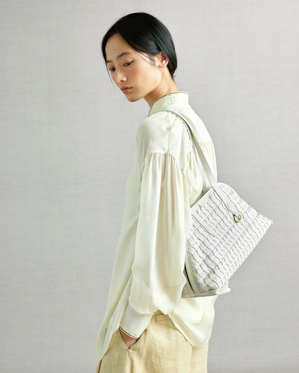 Handbag with lattice shellseeker pattern